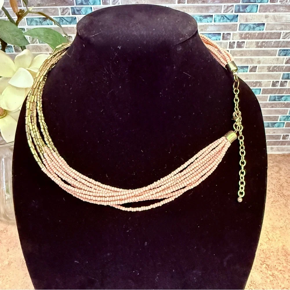 Beautiful pink and gold multi strand seed bead necklace